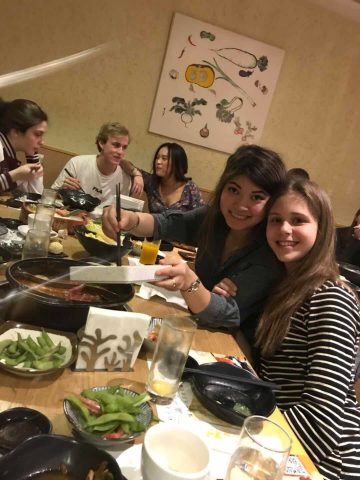 Inge and Fabiola enjoying food